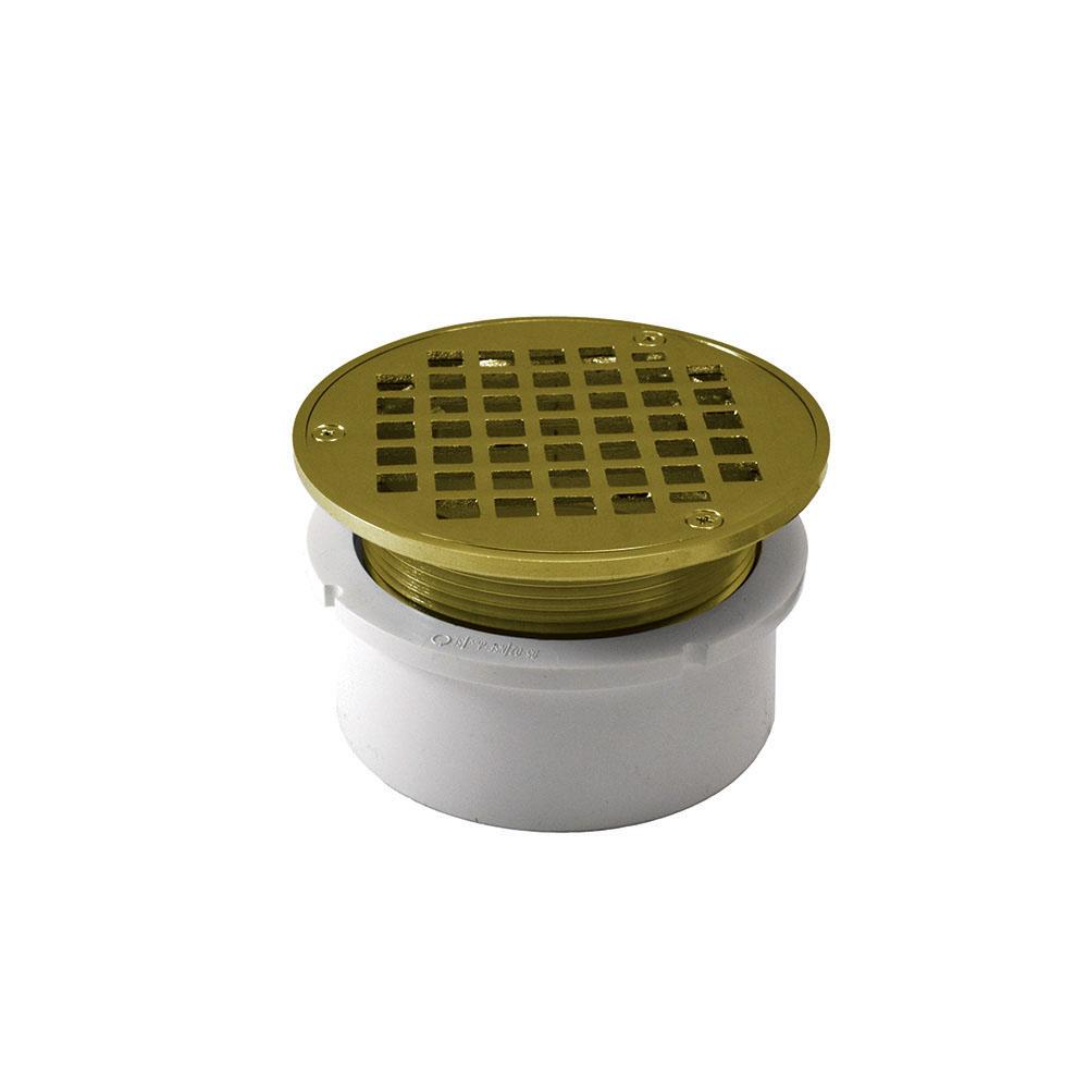Jones Stephens D53006 4" PVC Hub Fit Drain Base with 3-1/2" Metal Spud and 6" Polished Brass Strainer