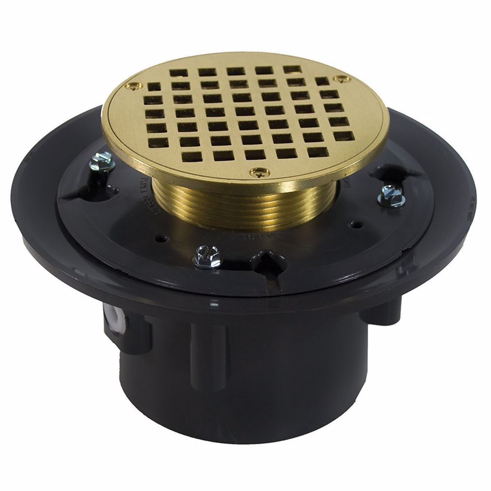 Jones Stephens D49061 2" x 3" Heavy Duty PVC Drain Base with 3-1/2" Metal Spud and 6" Polished Brass Strainer