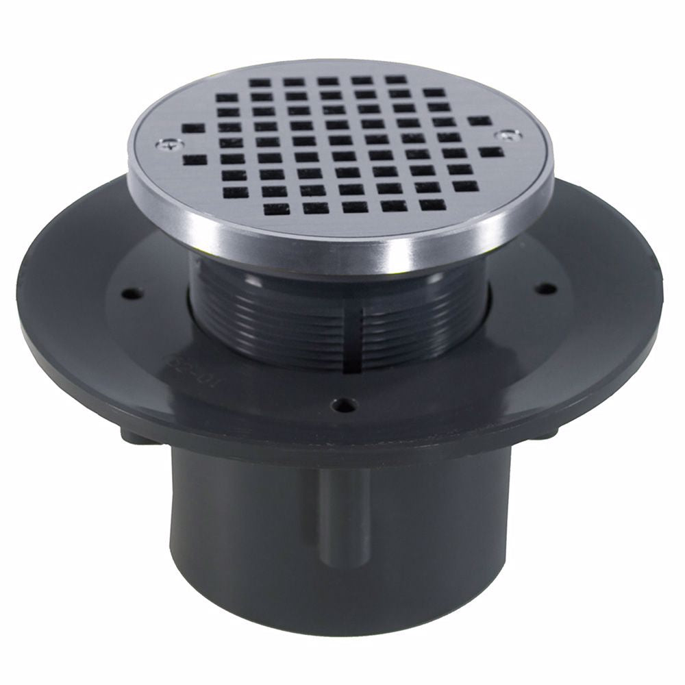 Jones Stephens D49349 2" x 3" Heavy Duty PVC Slab Drain Base with 3-1/2" Plastic Spud and 6" Chrome Plated Strainer with Ring