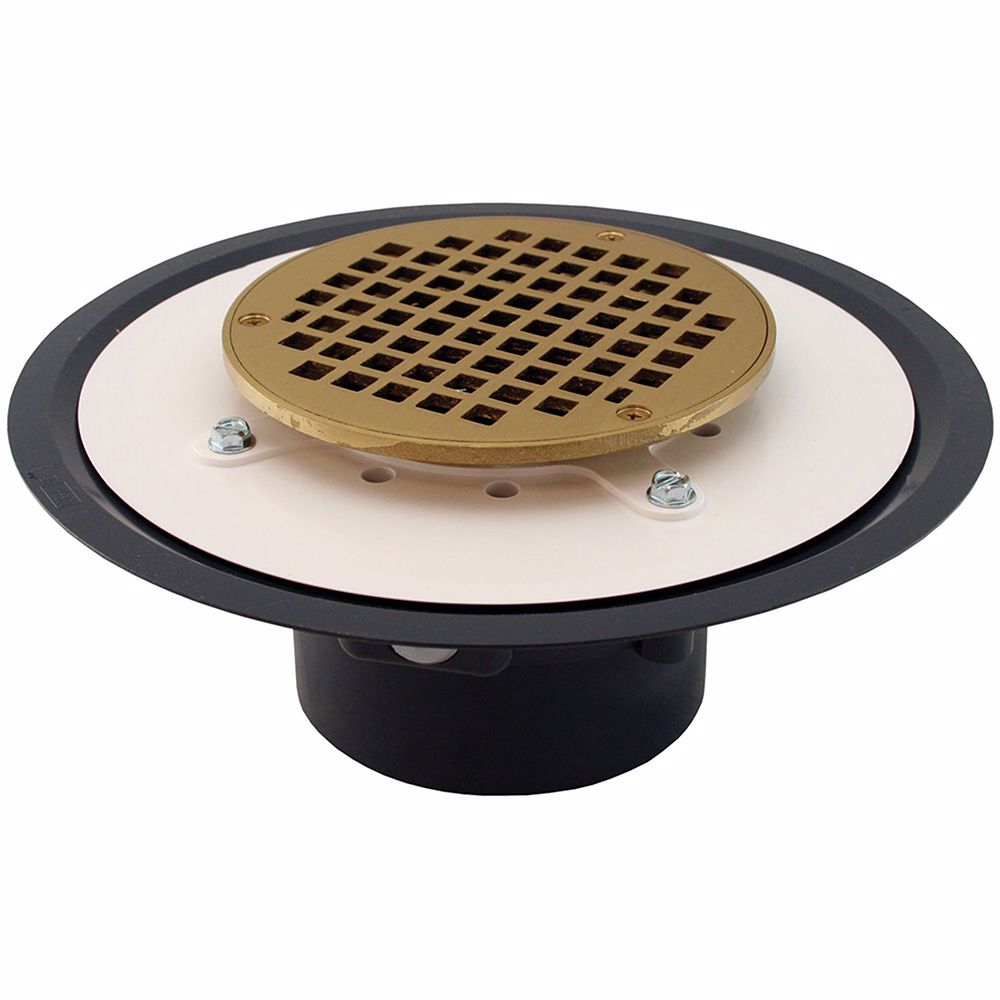 Jones Stephens D50016 4" Heavy Duty PVC Drain Base with 3-1/2" Metal Spud and 6" Polished Brass Strainer