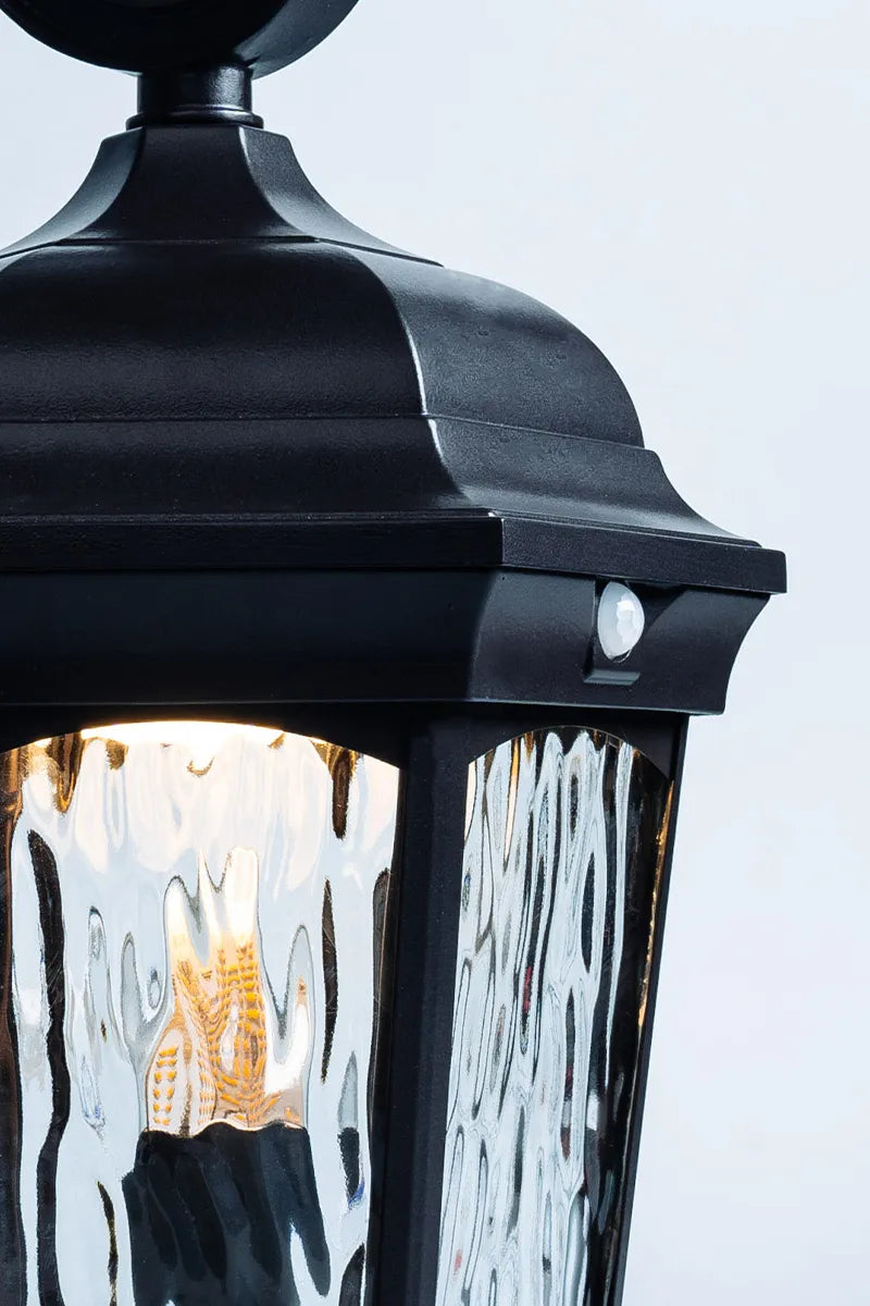 Euri Lighting EFL-130W-MD Decorative Fixture LED Flickering Flame Lantern with Dual Security Light and Flame Mode Wet Rated Motion Sensor Dusk to Dawn, Bronze Finish with Water Glass