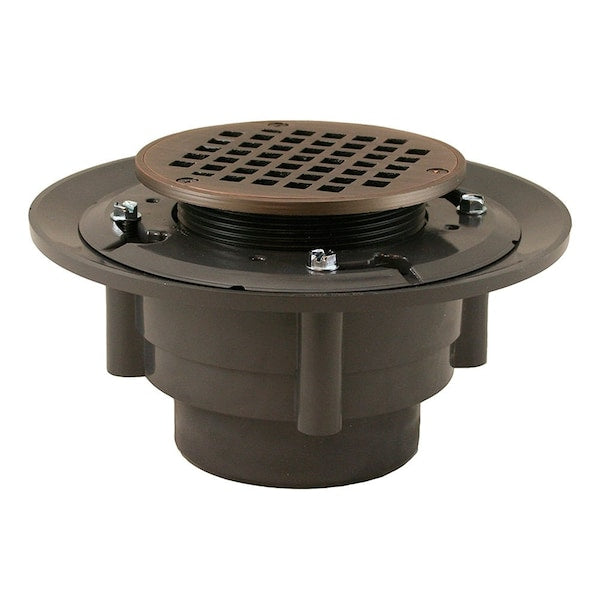 Jones Stephens D4991WB 3" x 4" Heavy Duty PVC Shower Drain with 3-1/2" Metal Spud and 5" Round Old World Bronze Strainer